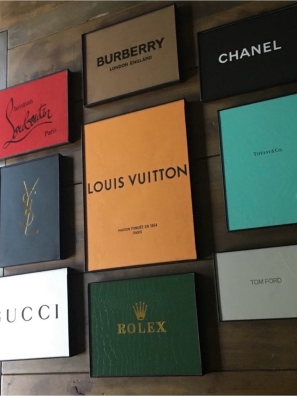 Handcrafted wall decor from authentic designer boxes and bags